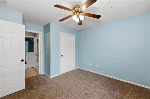 Bedroom - 1404 Cedar Ridge Cir, Raymore, MO 64083 photo 2 of 5