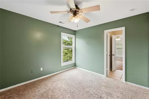 Bedroom - 1404 Cedar Ridge Cir, Raymore, MO 64083 photo 4 of 5