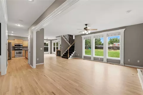 Living - 1404 Cedar Ridge Cir, Raymore, MO 64083 photo 1 of 9