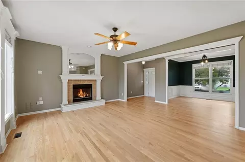 Living - 1404 Cedar Ridge Cir, Raymore, MO 64083 photo 3 of 9