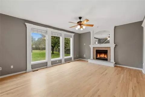 Living - 1404 Cedar Ridge Cir, Raymore, MO 64083 photo 4 of 9