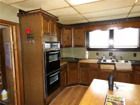 Kitchen - 107 N Walnut St, Emma, MO 65327 photo 2 of 2