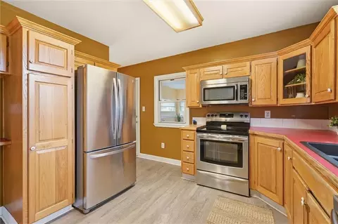 Kitchen - 11411 E Norledge St, Sugar Creek, MO 64054 photo 3 of 3
