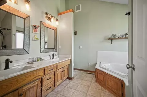 Bath - 1108 E 18th St, Kearney, MO 64060 photo 1 of 4