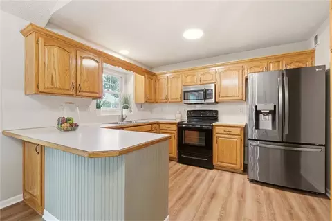 Kitchen - 1208 NE Beacon Ave, Lees Summit, MO 64086 photo 1 of 2