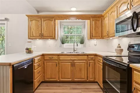 Kitchen - 1208 NE Beacon Ave, Lees Summit, MO 64086 photo 2 of 2