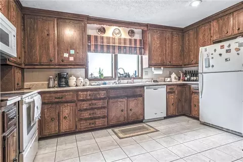 Kitchen - 33421 Mcclellen Rd, Drexel, MO 64742 photo 1 of 1
