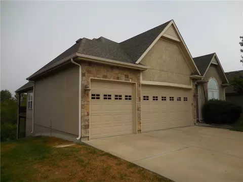 Exterior - 1446 Brompton Ln, Raymore, MO 64083 photo 2 of 6
