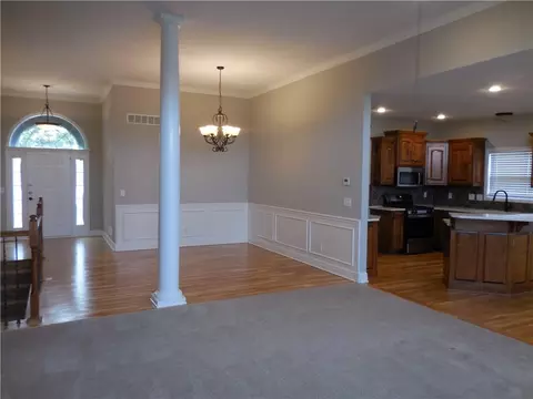 Living - 1446 Brompton Ln, Raymore, MO 64083 photo 5 of 10
