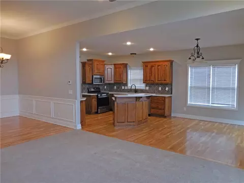 Living - 1446 Brompton Ln, Raymore, MO 64083 photo 4 of 10