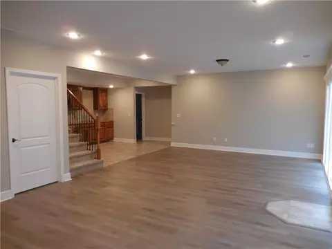 Living - 1446 Brompton Ln, Raymore, MO 64083 photo 9 of 10