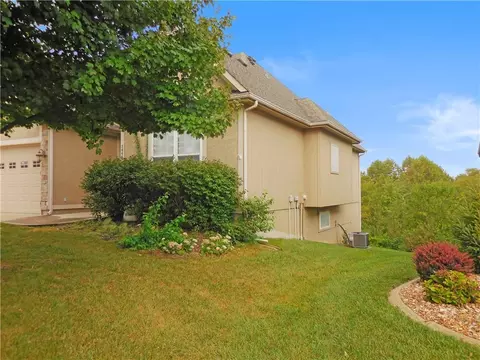 Exterior - 1446 Brompton Ln, Raymore, MO 64083 photo 3 of 6