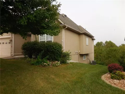 Exterior - 1446 Brompton Ln, Raymore, MO 64083 photo 3 of 6