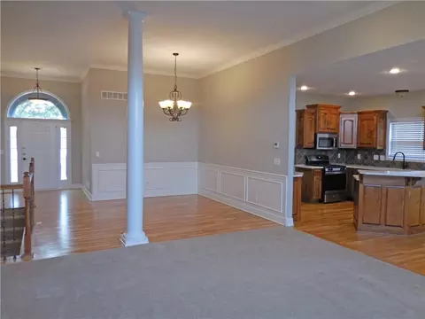 Living - 1446 Brompton Ln, Raymore, MO 64083 photo 5 of 10