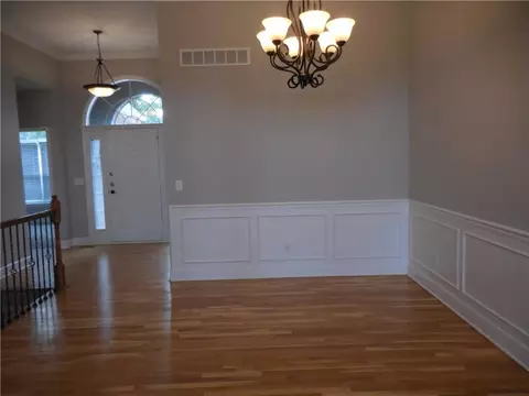 Living - 1446 Brompton Ln, Raymore, MO 64083 photo 6 of 10