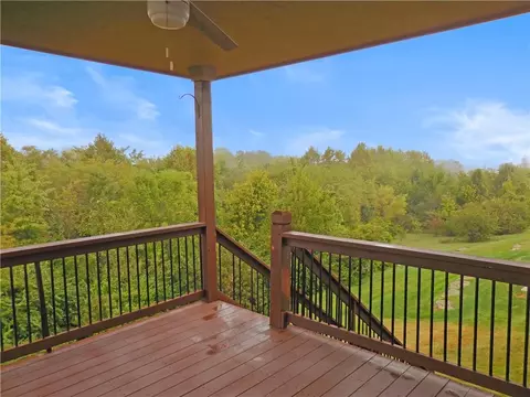 Exterior - 1446 Brompton Ln, Raymore, MO 64083 photo 4 of 6