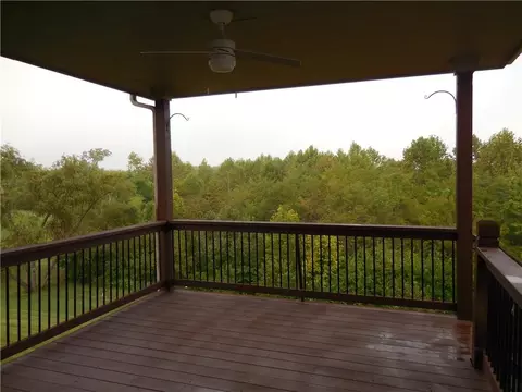 Exterior - 1446 Brompton Ln, Raymore, MO 64083 photo 4 of 6