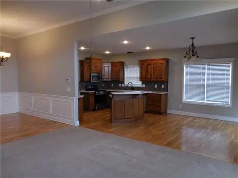 Living - 1446 Brompton Ln, Raymore, MO 64083 photo 4 of 10