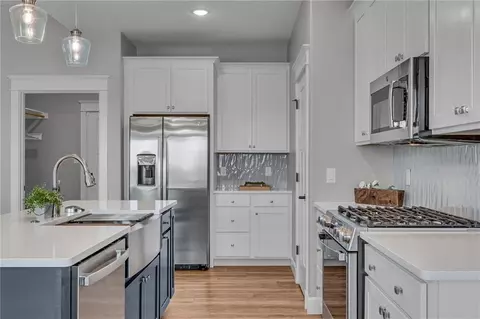 Kitchen - 338 W 25th St, Eudora, KS 66025 photo 3 of 6