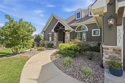 Exterior - 1201 Serenity Ct, Raymore, MO 64083 photo 5 of 16