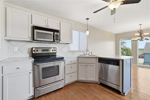 Kitchen - 615 Seaton Blvd, Raymore, MO 64083 photo 2 of 2