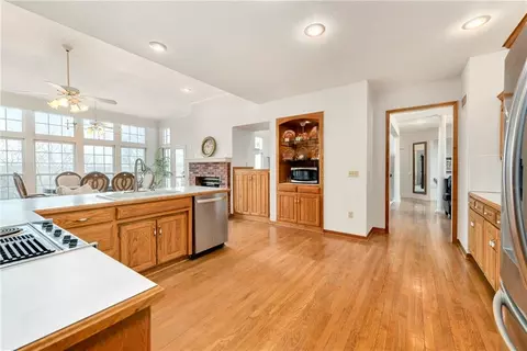 Kitchen - 1028 NE Moss Point Rd, Lees Summit, MO 64064 photo 5 of 8