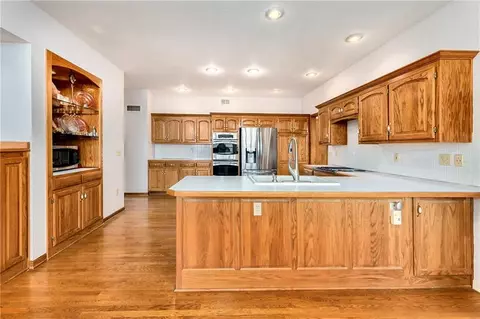 Kitchen - 1028 NE Moss Point Rd, Lees Summit, MO 64064 photo 3 of 8