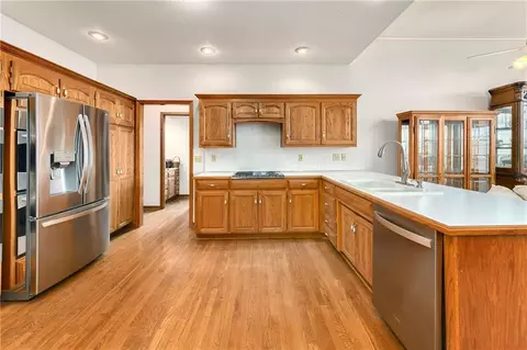 Kitchen - 1028 NE Moss Point Rd, Lees Summit, MO 64064 photo 2 of 8