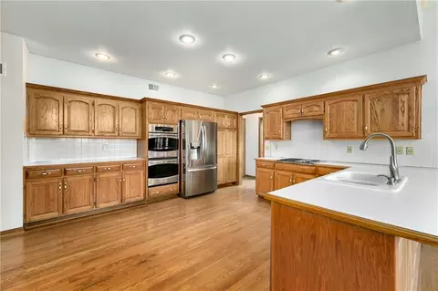 Kitchen - 1028 NE Moss Point Rd, Lees Summit, MO 64064 photo 1 of 8