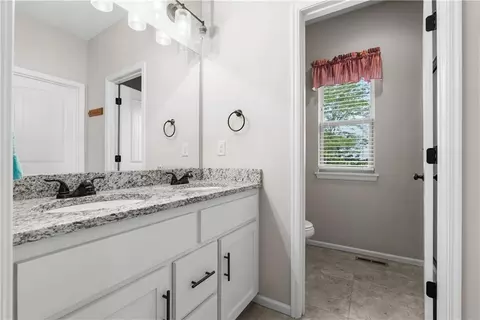 Bath - 1406 SW 8th Ter, Oak Grove, MO 64075 photo 1 of 4