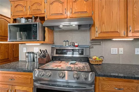 Kitchen - 907 N 5th St, Drexel, MO 64742 photo 4 of 5