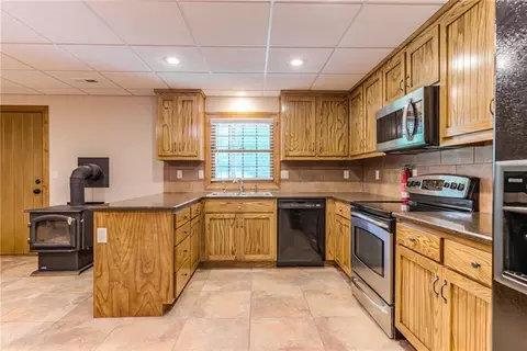 Kitchen - 25205 E Blue Mills Rd, Independence, MO 64058 photo 6 of 6