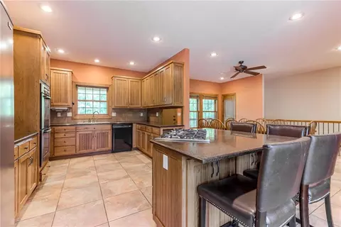 Kitchen - 25205 E Blue Mills Rd, Independence, MO 64058 photo 2 of 6