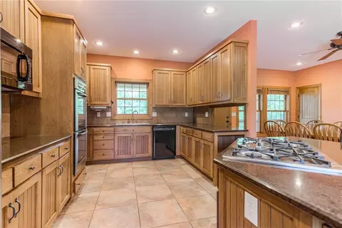 Kitchen - 25205 E Blue Mills Rd, Independence, MO 64058 photo 3 of 6