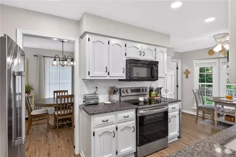 Kitchen - 1104 NE Oak Tree Dr, Lees Summit, MO 64086 photo 3 of 3