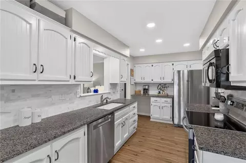 Kitchen - 1104 NE Oak Tree Dr, Lees Summit, MO 64086 photo 2 of 3