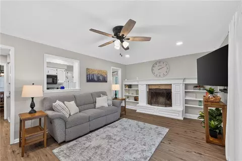 Living - 1104 NE Oak Tree Dr, Lees Summit, MO 64086 photo 5 of 6