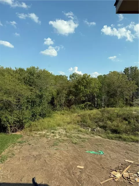 Exterior - 833 Reed Dr, Raymore, MO 64083 photo 2 of 4