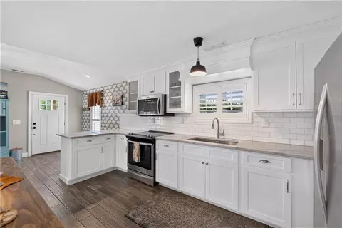 Kitchen - 112 W Main St, Freeman, MO 64746 photo 3 of 4