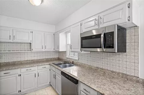 Kitchen - 3916 S Spring St, Independence, MO 64055 photo 2 of 3