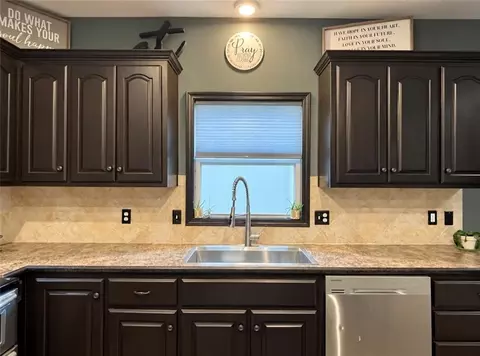Kitchen - 712 S Adams St, Raymore, MO 64083 photo 5 of 6