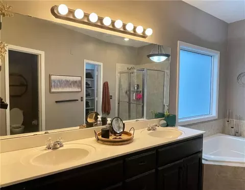 Bath - 712 S Adams St, Raymore, MO 64083 photo 1 of 8