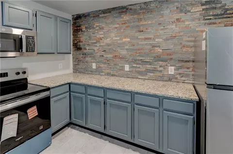 Kitchen - 326 E Main St, Odessa, MO 64076 photo 7 of 8