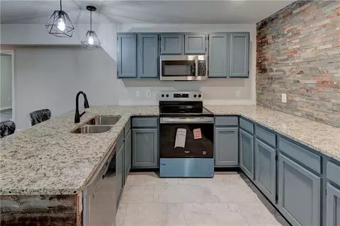 Kitchen - 326 E Main St, Odessa, MO 64076 photo 4 of 8