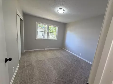 Bedroom - 407 Elm St, Drexel, MO 64742 photo 3 of 5
