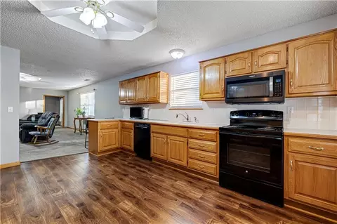 Kitchen - 523 Mars Ct, Raymore, MO 64083 photo 4 of 4