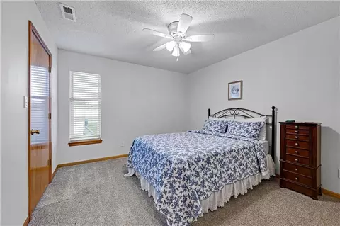 Bedroom - 523 Mars Ct, Raymore, MO 64083 photo 2 of 2