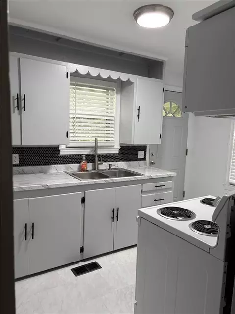 Kitchen - 10821 E 19th St, Independence, MO 64052 photo 1 of 3