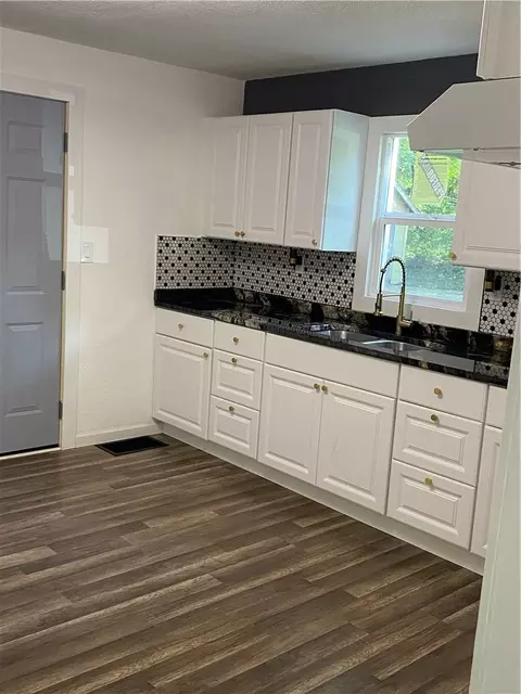 Kitchen - 1229 S Crisp St, Independence, MO 64052 photo 2 of 3