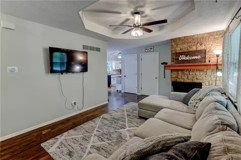 Living - 1823 NE Mckee Ln, Lees Summit, MO 64086 photo 2 of 3